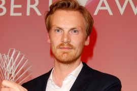 epa07241842 German journalist Claas Relotius holds his award trophy of the Reemtsma Liberty Award, a German journalist award, in Berlin, Germany, 22 March 2017 (issued 20 December 2018). German weekly magazine 'Der Spiegel' announced on 19 December 2018 that their reporter Claas Relotius had falsified a number of stories in the past years. This was uncovered by his colleague Juan Moreno after he worked together with Relotius on the story 'Jaegers Grenze' (Jaeger's border'). EPA-EFE/GOLEJEWSKI MANDATORY CREDIT 'EVENTPRESS/GOLEJEWSKI/EPA-EFE'