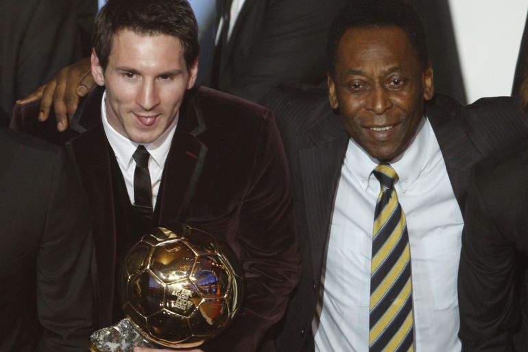 Lionel Messi of Argentina (L), FIFA World Player of the Year holds his FIFA Ballon d'Or 2011 trophy next to Pele during the FIFA Ballon d'Or 2011 soccer awards ceremony at the Kongresshaus in Zurich January 9, 2012. REUTERS/Christian Hartmann (SWITZERLAND - Tags: SPORT SOCCER ENTERTAINMENT)