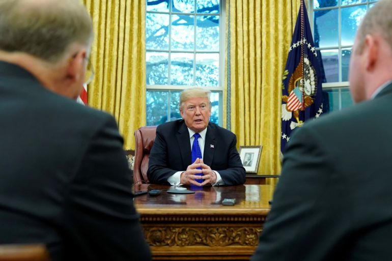 U.S. President Donald Trump sits for an exclusive interview with Reuters journalists in the Oval Office at the White House in Washington, U.S. December 11, 2018. REUTERS/Jonathan Ernst