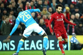 LIVERPOOL, ENGLAND - DECEMBER 11: Mohamed Salah of Liverpool takes on Kalidou Koulibaly of Napoli during the UEFA Champions League Group C match between Liverpool and SSC Napoli at Anfield on December 11, 2018 in Liverpool, United Kingdom. (Photo by Clive Brunskill/Getty Images)