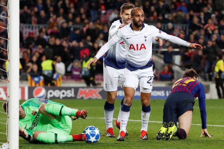 Soccer Football - Champions League - Group Stage - Group B - FC Barcelona v Tottenham Hotspur - Camp Nou, Barcelona, Spain - December 11, 2018 Tottenham's Lucas Moura celebrates with Fernando Llorente after scoring their first goal Action Images via Reuters/Paul Childs