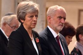 Britain's Prime Minister Theresa May, and the leader of opposition Labour Party, Jeremy Corbyn attend an Armistice remembrance service at St Margaret's Church, in London, Britain November 6, 2018. John Stillwell/Pool via REUTERS
