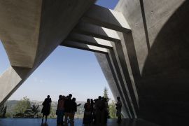 Visitors looks at the view after a tour of the Yad Vashem Holocaust History Museum in Jerusalem November 2, 2010. November 9th marks the 72nd anniversary of