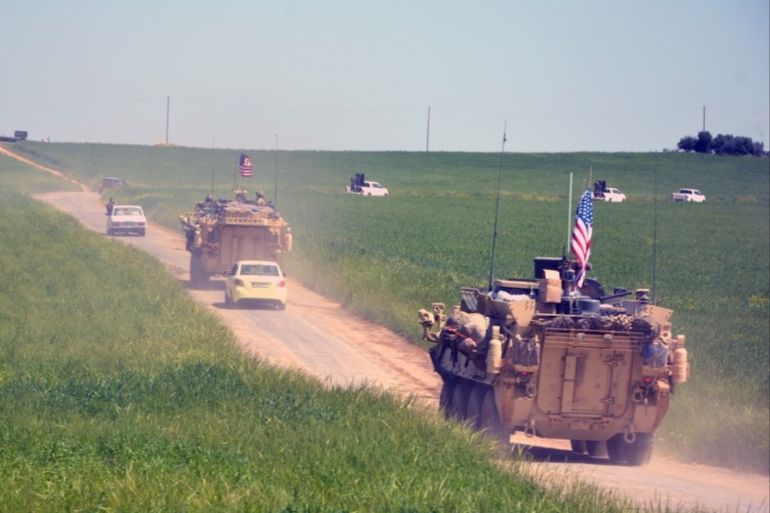 epa07274792 (FILE) - A convoy of US army troops and the People's Protection Units (YPG) Kurdish militia patrol near al-Ghanamya village, al-Darbasiyah town at the Syrian-Turkish border, Syria, 29 April 2017 (reissued 11 January 2019). The US-led military coalition in Syria has begun the process of withdrawing troops from Syria, a US military official said according to media reports on 11 January 2019. EPA-EFE/YOUSSEF RABIE YOUSSEF
