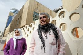 Bahraini human rights activist Nabeel Rajab (R) walks with his daughter Malak Rajab to attend his appeal hearing at court in Manama, February 11, 2015. Bahrain had sentenced Nabeel Rajab, one of the highest-profile democracy campaigners in the Arab world, to six months in jail last month over remarks critical of the state, according to the Twitter accounts of his lawyer and the public prosecutor. REUTERS/Hamad Mohammed (BAHRAIN - Tags: POLITICS CIVIL UNREST CRIME LAW