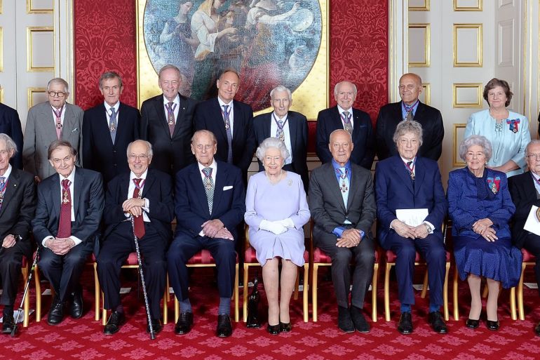 The Order of Merit members pose for a group photograph (left to right back row) , Sir James Dyson, Lord Darzi of Denham, David Hockney, Neil MacGregor, The Rt Hon Jean Chretien, Sir Tim Berners-Lee, Lord Rees of Ludlow, John Howard, Professor Sir Magdi Yacoub, Professor Dame Ann Dowling, Lord Robert Fellowes, (left to right seated) Sir David Attenborough, Lord Rothschild, Professor Lord May of Oxford, Professor Sir Roger Penrose, Sir Michael Atiyah, the Duke of Edinb