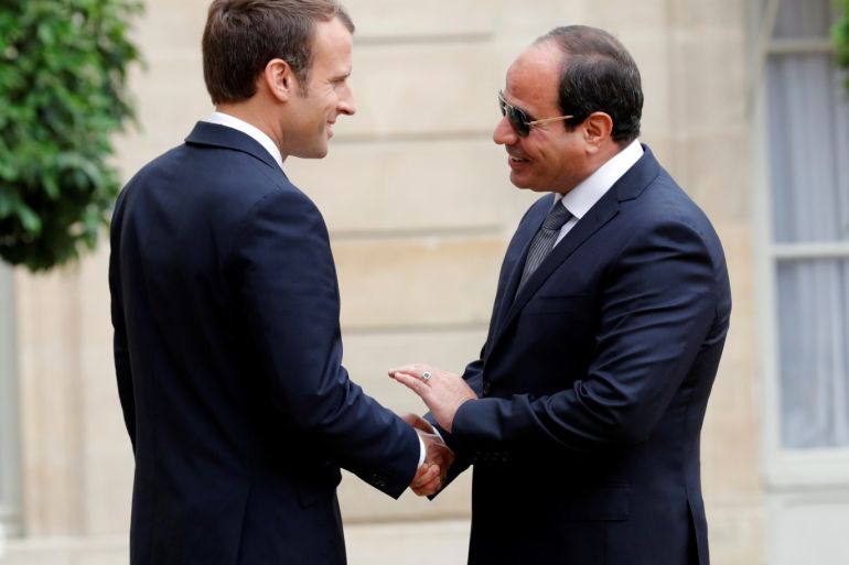 French President Emmanuel Macron welcomes Egyptian President Abdel Fattah al-Sisi at the Elysee Palace, in Paris, France, October 24, 2017. REUTERS/Philippe Wojazer
