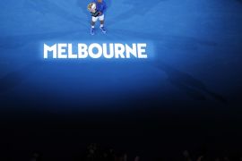 Tennis - Australian Open - Men's Singles Final - Melbourne Park, Melbourne, Australia, January 27, 2019. Serbia's Novak Djokovic poses with the championship trophy after winning his match against Spain's Rafael Nadal. REUTERS/Adnan Abidi