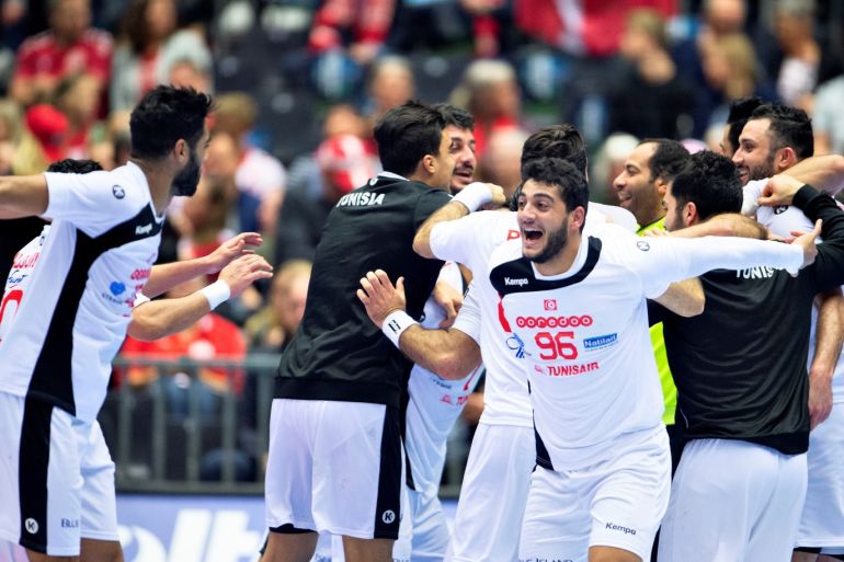IHF Handball World Championship - Germany &amp; Denmark 2019 - Group C - Austria v Tunisia - Herning, Denmark - January 17, 2019. Tunisia's players celebrate their victory. Ritzau Scanpix/Henning Bagger via REUTERS ATTENTION EDITORS - THIS IMAGE WAS PROVIDED BY A THIRD PARTY. DENMARK OUT.