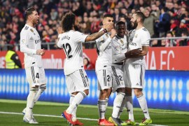 GIRONA, SPAIN - JANUARY 31: Karim Benzema of Real Madrid celebrates scoring to make it 2-0 with team mates during the Copa del Quarter Final match between Girona and Real Madrid at Montilivi Stadium on January 31, 2019 in Girona, Spain. (Photo by David Ramos/Getty Images )