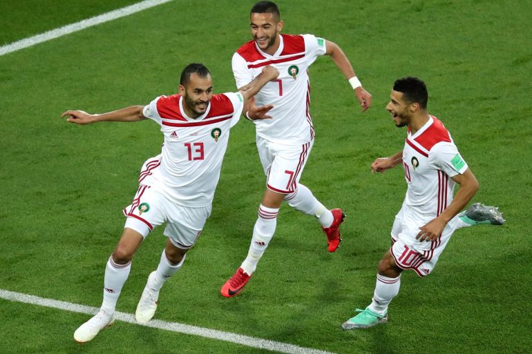 Soccer Football - World Cup - Group B - Spain vs Morocco - Kaliningrad Stadium, Kaliningrad, Russia - June 25, 2018 Morocco's Khalid Boutaib celebrates with Hakim Ziyech and Younes Belhanda after scoring their first goal REUTERS/Mariana Bazo TPX IMAGES OF THE DAY