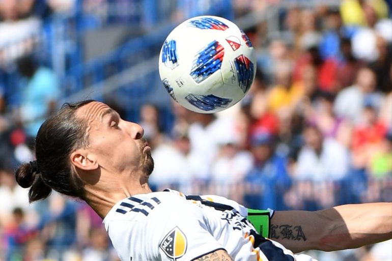 May 21, 2018; Montreal, Quebec, CAN; Los Angeles Galaxy forward Zlatan Ibrahimovic (9) plays the ball against the Montreal Impact during the first half at Stade Saputo. Mandatory Credit: Eric Bolte-USA TODAY Sports