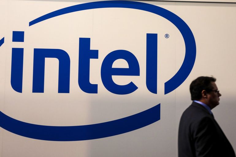 A visitor passes an Intel logo at the Mobile World Congress in Barcelona, Spain, February 26, 2018. REUTERS/Sergio Perez