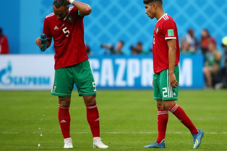Soccer Football - World Cup - Group B - Morocco vs Iran - Saint Petersburg Stadium, Saint Petersburg, Russia - June 15, 2018 Morocco's Medhi Benatia and Achraf Hakimi during the match REUTERS/Michael Dalder