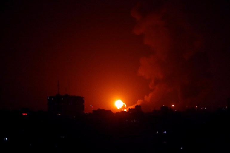 An explosion is seen during Israeli air strikes in Gaza January 22, 2019. REUTERS/Ahmed Zakot