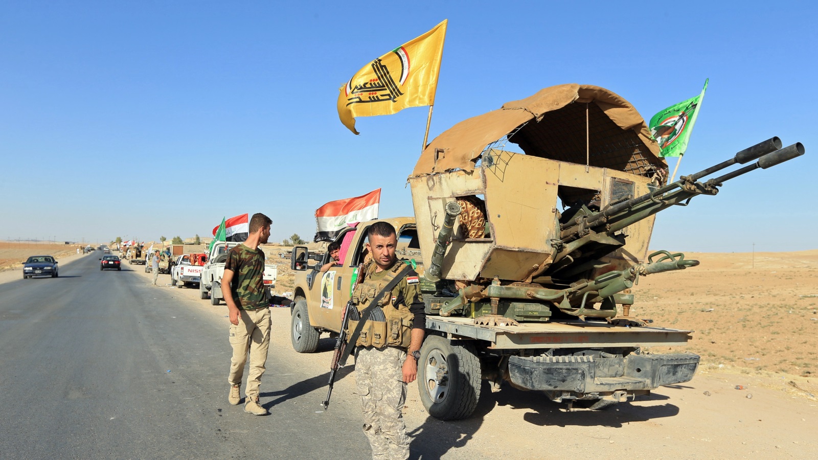 عناصر من الحشد الشعبي في محافظة نينوى شمال العراق(رويترز)