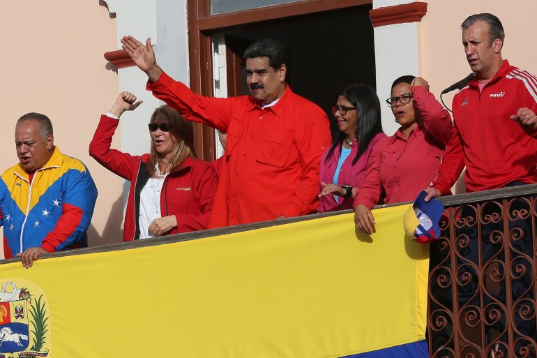 CARACAS, VENEZUELA - JANUARY 23: President of Venezuela Nicolás Maduro (C) gives a speech to his supporters form the Balcón del Pueblo of the Miraflores Government Palace on January 23, 2019 in Caracas, Venezuela. Earlier today, Venezuelan opposition leader and head of the National Assembly Juan Guaido declared self interim president as was officially accepted by presidents of many countries such as US, Brazil, Chile, Canada and Argentina. Head of Supreme Justice tribunal Juan Jose Mendoza urged general attorney to act against a constitution violation. Protests continue in Caracas. (Photo by Edilzon Gamez/Getty Images)