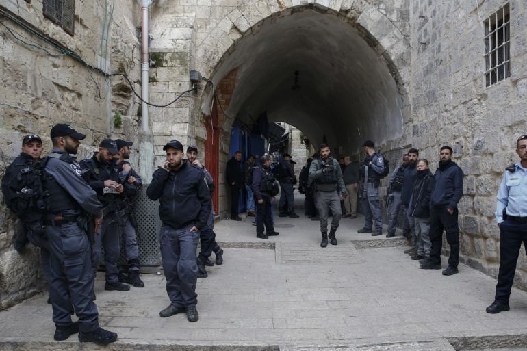 Israel evicts Palestinian family from their home in Jerusalem- - JERUSALEM - FEBRUARY 17: Israeli forces stand guard in front of a house after evicting the owners Palestinian Abu Assab family in Old City quarter of East Jerusalem on February 17, 2019.