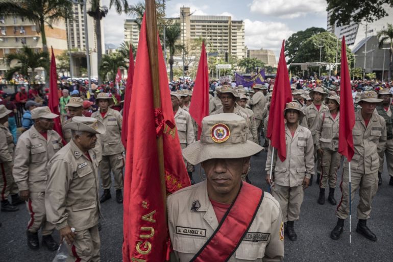 Venezuelan President Nicolas Maduro's supporters' gathering in Caracas- - CARACAS, VENEZUELA - FEBRUARY 2: National Bolivarian Militia of Venezuela members march during a gathering organized by United Socialist Party of Venezuela (PSUV) to mark the 20th anniversary of Bolivarian Revolution led by Hugo Chavez, in Caracas, Venezuela on February 2, 2019.