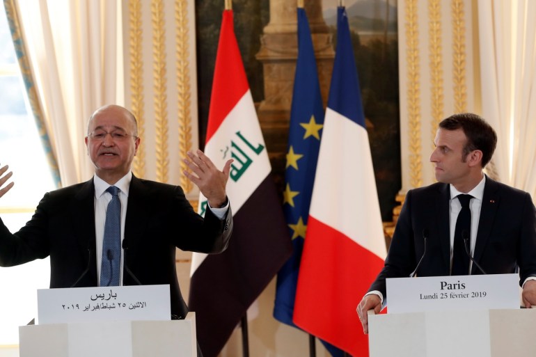 French president Emmanuel Macron and Iraqi President Barham Salih attend a news conference at the Elysee Palace in Paris, France, February 25, 2019. Christophe Ena/Pool via REUTERS