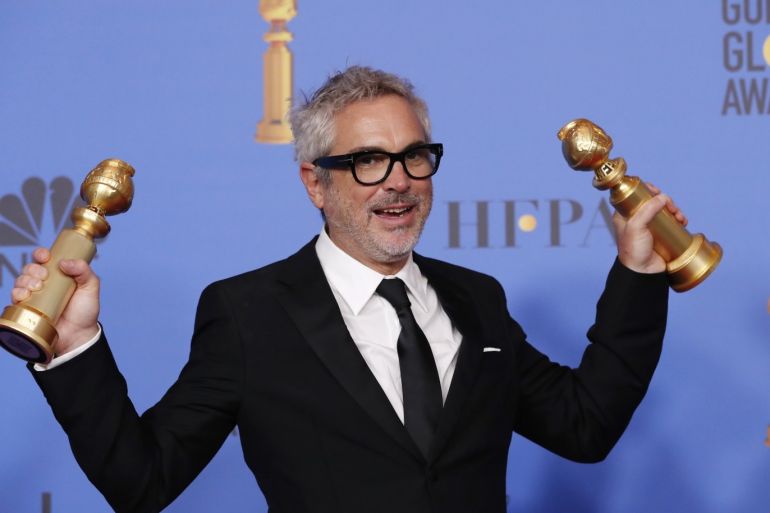 76th Golden Globe Awards - Photo Room - Beverly Hills, California, U.S., January 6, 2019 Alfonso Cuaron poses backstage with his Best Director - Motion Picture and Best Motion Picture - Foreign Language for
