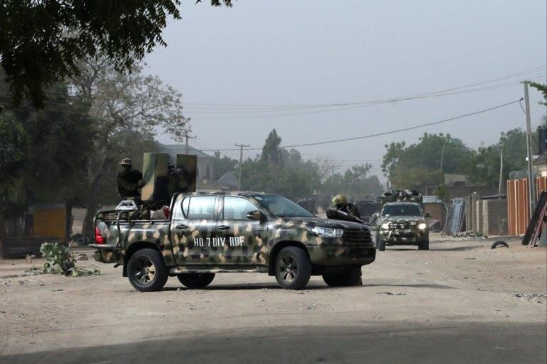 Nigerian military secure the area where a man was killed by suspected militants during an attack around Polo area of Maiduguri, Nigeria February 16, 2019. REUTERS/Afolabi Sotunde