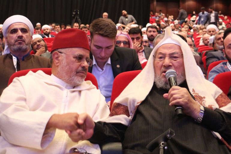 Meeting in Istanbul of IUMS's general assembly- - ISTANBUL, TURKEY - NOVEMBER 7: Yusuf al-Qaradawi (R), former president of the International Muslim Scholars' Union (IUMS), speaks as Ahmed al-Raissouni (L), newly elected President of Muslim scholars' union listens during the meeting of the IUMS's general assembly, in Istanbul, Turkey on November 7, 2018.