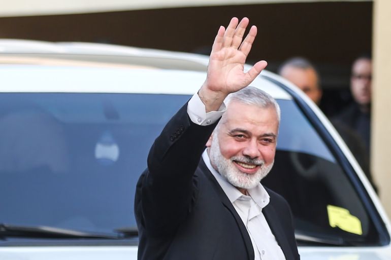 Head of the Political Bureau of Hamas Haniyeh receives Al-Emadi- - GAZA CITY, GAZA -JANUARY 24: Head of the Political Bureau of Hamas, Ismail Haniyeh waves as he receives Chairman of the Qatari Committee for the Reconstruction of Gaza Ambassador Mohammed Al-Emadi (not seen) at his residence in Gaza City, Gaza on January 24, 2019.