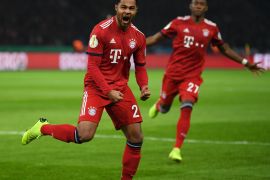 BERLIN, GERMANY - FEBRUARY 06: Serge Gnabry of Bayern Munich celebrates after scoring his sides first goal during the DFB Cup match between Hertha BSC and FC Bayern Muenchen at Olympiastadion on February 06, 2019 in Berlin, Germany. (Photo by Stuart Franklin/Bongarts/Getty Images)