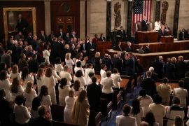Democratic women of the U.S. House of Representatives stand and applaud as U.S. President Donald Trump delivers his second State of the Union address to a joint session of the U.S. Congress in the House Chamber of the U.S. Capitol on Capitol Hill in Washington, U.S. February 5, 2019. REUTERS/Leah Millis