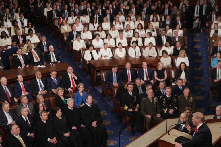 WASHINGTON, DC - FEBRUARY 05: Female lawmakers dressed in white watch as President Donald Trump delivers the State of the Union address in the chamber of the U.S. House of Representatives at the U.S. Capitol Building on February 5, 2019 in Washington, DC. A group of female Democratic lawmakers chose to wear white to the speech in solidarity with women and a nod to the suffragette movement. Alex Wong/Getty Images/AFP== FOR NEWSPAPERS, INTERNET, TELCOS & TELEVISION USE ONLY ==