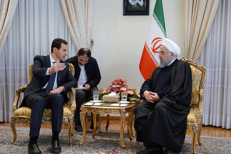 Syria's President Bashar al-Assad meets Iranian President Hassan Rouhani in Tehran, Iran in this handout released by SANA on February 25, 2019. SANA/Handout via REUTERS ATTENTION EDITORS - THIS IMAGE WAS PROVIDED BY A THIRD PARTY. REUTERS IS UNABLE TO INDEPENDENTLY VERIFY THIS IMAGE