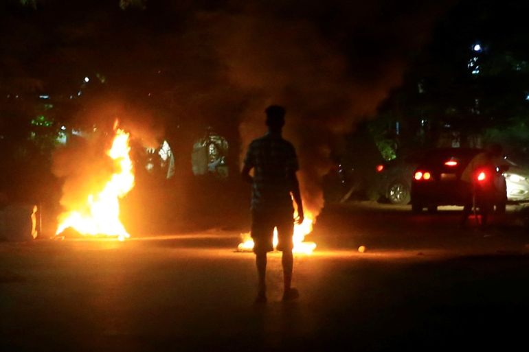 Protesters set fires along a street in Khartoum, Sudan February 23, 2019. REUTERS/Mohamed Nureldin Abdallah