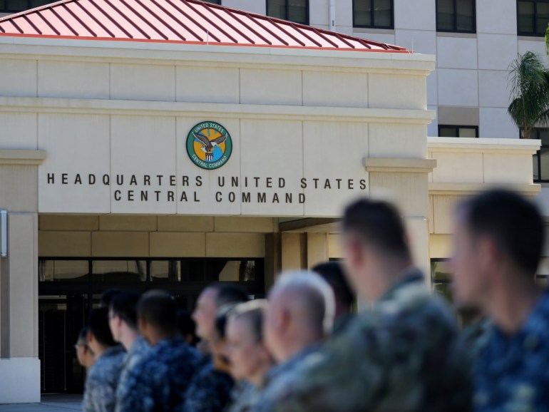 U.S. military personnel stand outside the U.S. Central Command (CENTCOM) and Special Operations Command (SOCOM) headquarters during U.S. President Donald Trump's visit in Tampa, Florida, U.S., February 6, 2017. REUTERS/Carlos Barria