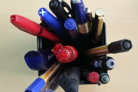 Various ball-pens are seen in a holder at an office in Kiev October 1, 2012. REUTERS/Gleb Garanich (UKRAINE - Tags: SOCIETY)