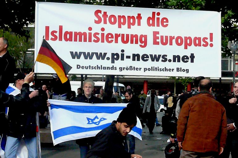 : مظاهرة ليمينيين متكرفين في برلين ترفع علم إسرائيل.