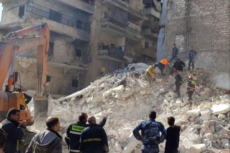epa07337713 A handout photo released by Syria's Arab News Agency SANA shows a collapsed building in the northern city of Aleppo, Syria, 02 February 2019. According to Sana, 11 people were killed when a five-story building collapsed in Saladin neighborhood in Aleppo. Another man was rescued from underneath the rubble. Sana added that the building located in a damaged area that was repeatedly hit by terrorist attacks, raising the likelihood that the building might be cra