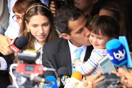 Venezuelan National Assembly's President Juan Guaido- - CARACAS, VENEZUELA - JANUARY 31: Venezuelan National Assembly's President Juan Guaido, who has appointed himself interim president, talks to the press members along with his wife Fabiana Rosales and his daughter, outside his home in Santa Fe, Caracas, Venezuela, on January 31, 2019. Juan Guaido claimed that members of Special Actions Force (FAES) arrived in his house to interrogate his wife and he made president Nicolas Maduro responsible for the security of his family.