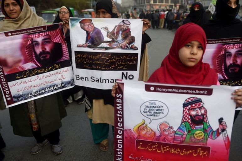 epa07373263 People hold a banner reading in Urdu 'We will not welcome Mohammad Bin Salman, killer of Journalist Jamal Khashogi and a war monger in Yemen' during a protest ahead of a visit by Saudi Crown Prince Mohammad Bin Salman, in Lahore, Pakistan, 15 February 2019. The crown prince of Saudi Arabia will travel this weekend to Pakistan where he is expected to announce multi-billion dollar investments to help the kingdom's traditional ally tide over financial crisis