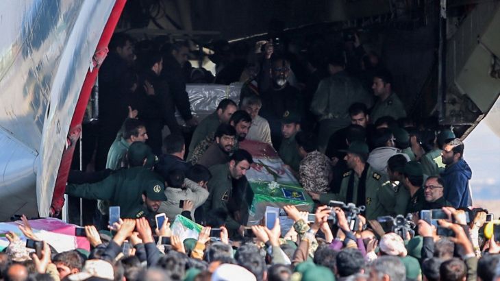 Iranians carry the coffins of members of Iran's elite Revolutionary Guards, who were killed by a suicide car bomb, at Isfahan airport, Iran February 14, 2019. Morteza Salehi/Tasnim News Agency/via REUTERS ATTENTION EDITORS - THIS PICTURE WAS PROVIDED BY A THIRD PARTY