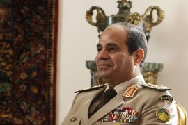 Egypt's Army Chief General Abdel Fattah al-Sisi attends a meeting with Egypt's interim President Adly Mansour, Russia's Defence Minister Sergei Shoigu and Foreign Minister Sergei Lavrov (not pictured) at El-Thadiya presidential palace in Cairo, November 14, 2013. Sisi hailed a new era of defense cooperation with Russia on Thursday during a visit by Russian officials, signaling Egyptian efforts to revive ties with an old ally and send a message to Washington after it