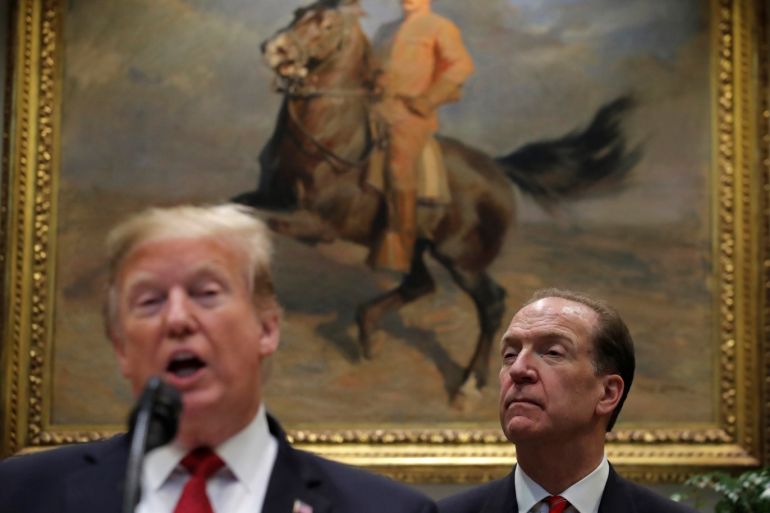 U.S. candidate in election for the next President of the World Bank David Malpass listens to an introduction by U.S. President Donald Trump at the White House in Washington, U.S., February 6, 2019. REUTERS/Jim Young