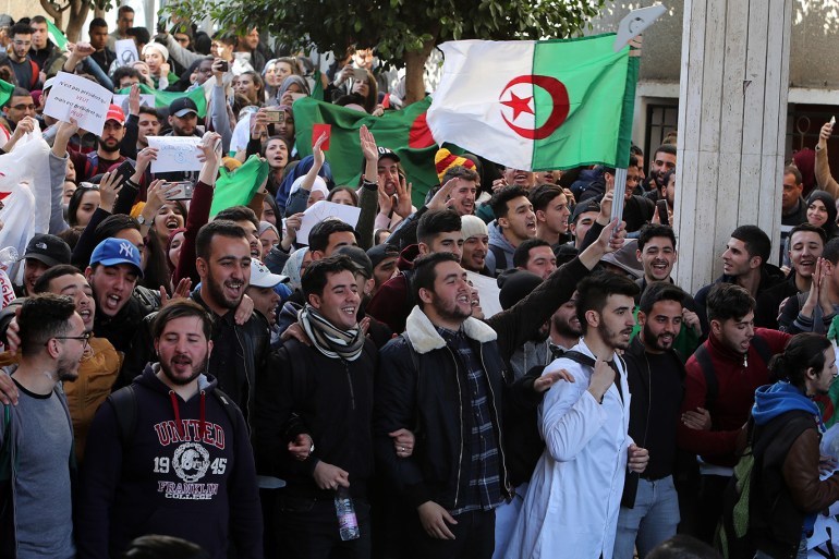 epa07398390 Algerian university students protest inside university campus against the fifth term of President Abdelaziz Bouteflika in Algiers, Algeria, 26 February 2019. Abdelaziz Bouteflika, serving as the president since 1999, has announced on 19 February he will be running for a fifth term in presidential elections scheduled for 18 April 2019. EPA-EFE/MOHAMED MESSARA