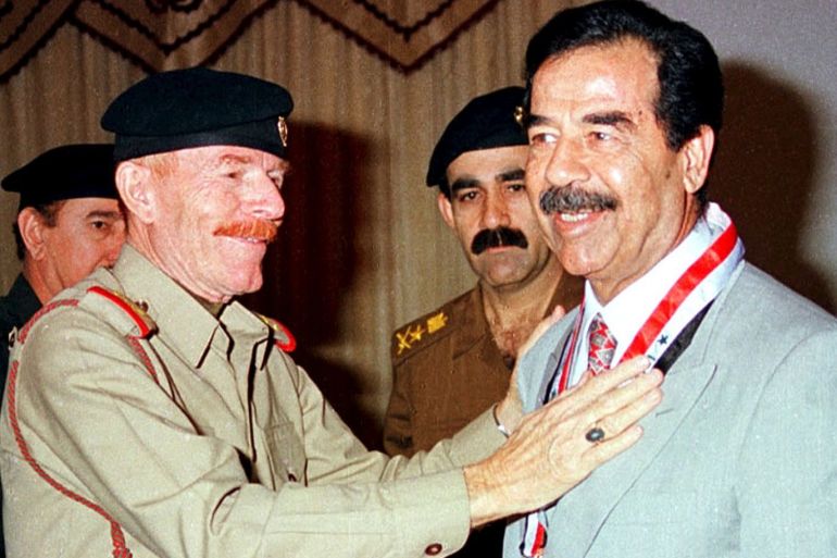 Ezzat al-Douri, an aide of former Iraqi President Saddam Hussein, is seen with Saddam in this undated file photo. REUTERS/Files