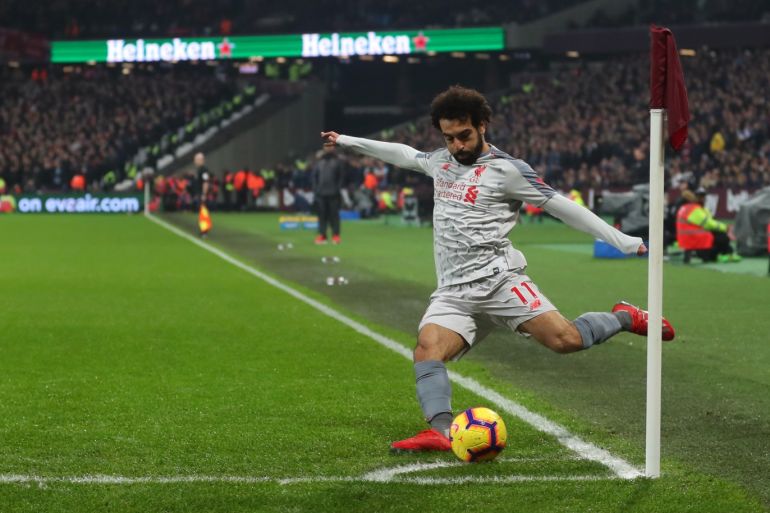 LONDON, ENGLAND - FEBRUARY 04: Mohamed Salah of Liverpool takes a corner kick during the Premier League match between West Ham United and Liverpool FC at London Stadium on February 04, 2019 in London, United Kingdom. (Photo by Catherine Ivill/Getty Images)