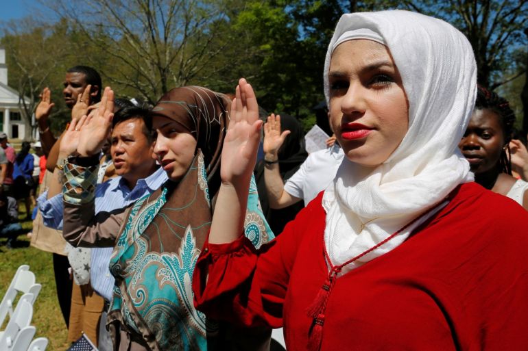 Hala Alhallaq of Iraq takes the Oath of Citizenship as she and 145 others become United States citizens during a naturalization ceremony at Old Sturbridge Village in Sturbridge, Massachusetts July 4, 2016, the United States' Independence Day. REUTERS/Brian Snyder