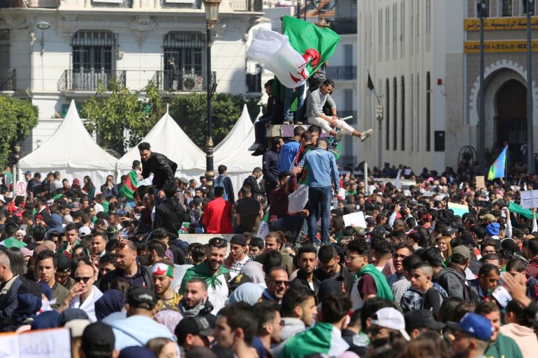 People take part in a protest demanding immediate political change in Algiers, Algeria March 12, 2019. REUTERS/Ramzi Boudina