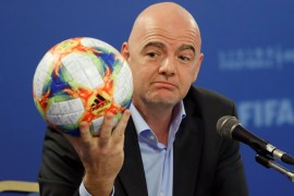 FIFA President Gianni Infantino shows an official ball of the 2019 FIFA Women's World Cup during his news conference in Rome, Italy, February 27, 2019. REUTERS/Remo Casilli