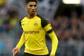 DORTMUND, GERMANY - MARCH 09: Achraf Hakimi of Dortmund runs with the ball during the Bundesliga match between Borussia Dortmund and VfB Stuttgart at Signal Iduna Park on March 09, 2019 in Dortmund, Germany. (Photo by Lars Baron/Bongarts/Getty Images)