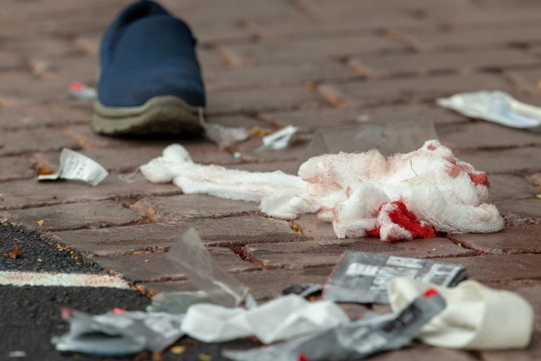 epa07438082 Bloodied bandages on the road following a shooting resulting in multiply fatalies and injuries at the Masjid Al Noor on Deans Avenue in Christchurch, New Zealand, 15 March 2019. According to media reports on 15 March 2019, a gunman opened fire at around 1:40 pm local time after walking into the mosque, killing at least six people. Armed police officers were deployed to the scene, along with emergency service personnel. Local authorities have advised resident